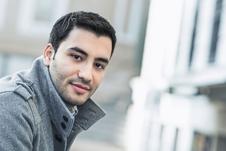 young man in coat