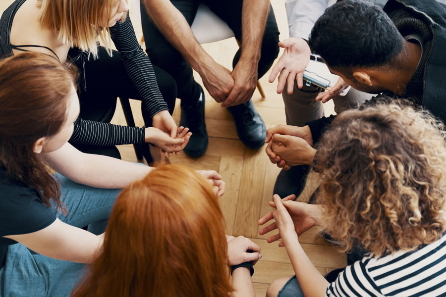 group of people in counselling session